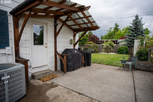 2580 Elysium Ave, Eugene, OR 97401 - view of patio with central AC unit, a pergola, a grill, and entry steps