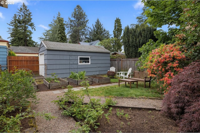 view of yard with a garden and fence
