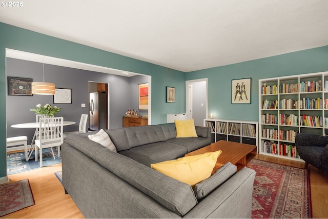 living room with wood finished floors