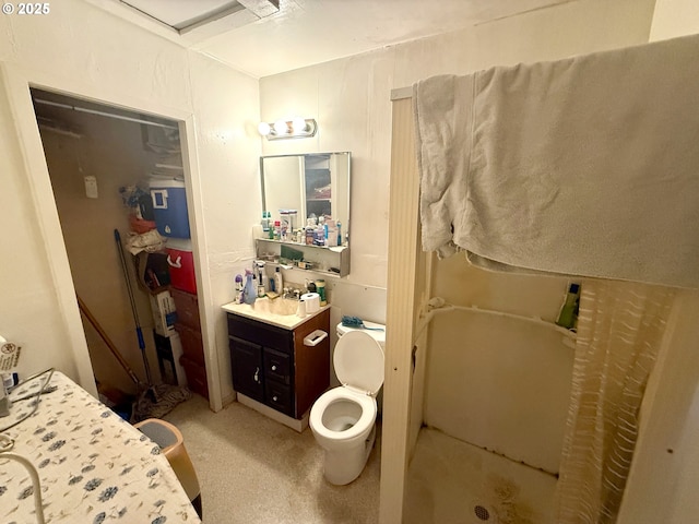 bathroom featuring vanity and a shower