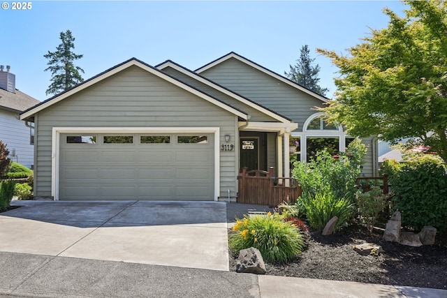 3119 SE 154th Ave, Vancouver, WA 98683 - view of front of property with concrete driveway and a garage