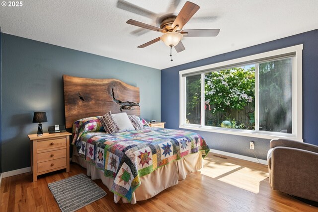 3119 SE 154th Ave, Vancouver, WA 98683 - bedroom with wood finished floors and a ceiling fan