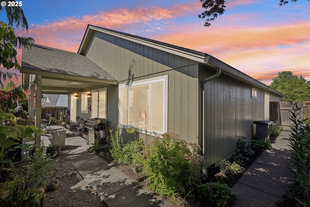 3119 SE 154th Ave, Vancouver, WA 98683 - view of side of home featuring a patio area and a shingled roof
