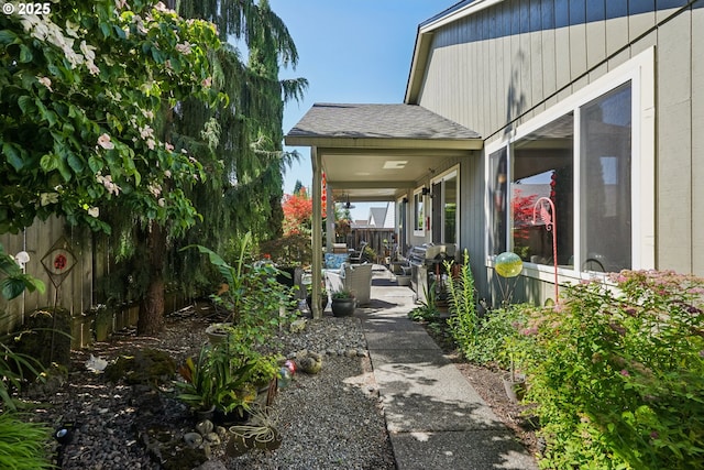 3119 SE 154th Ave, Vancouver, WA 98683 - view of side of home with a patio area and roof with shingles