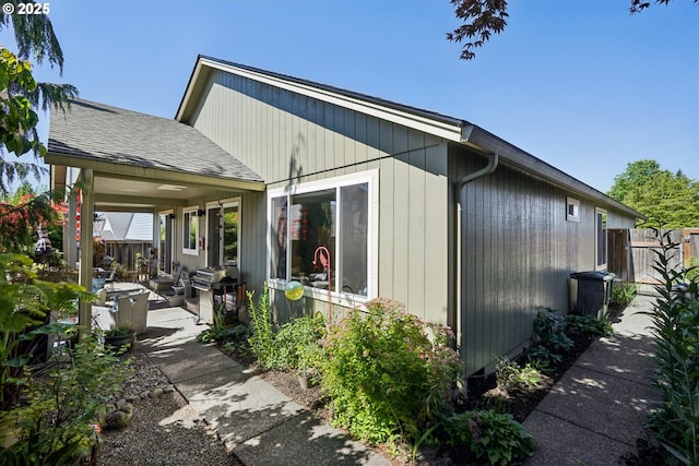 3119 SE 154th Ave, Vancouver, WA 98683 - view of side of property featuring a patio area and a shingled roof