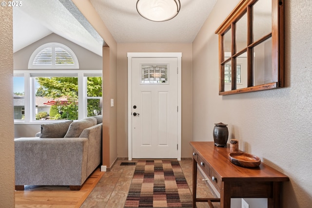 3119 SE 154th Ave, Vancouver, WA 98683 - entryway with lofted ceiling and a textured wall