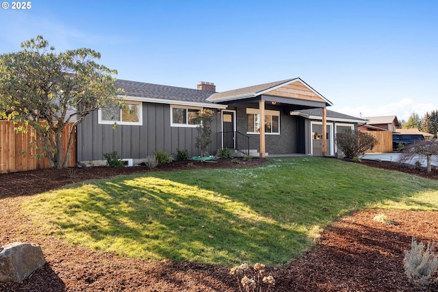 single story home featuring a front yard