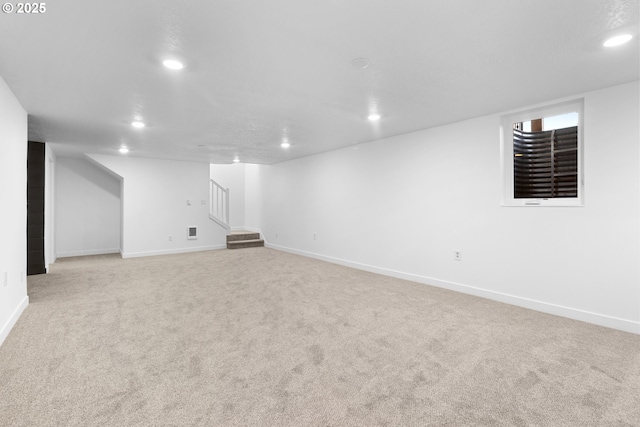 basement with light carpet