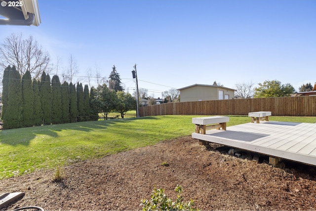 view of yard featuring a deck