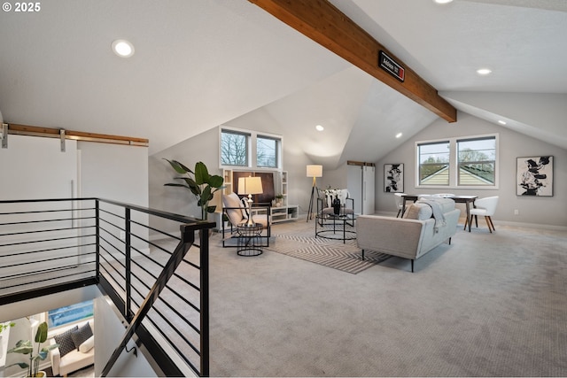 carpeted living room featuring lofted ceiling with beams