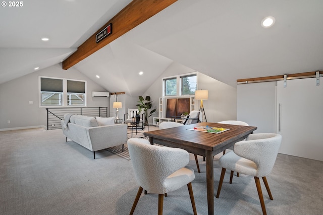 carpeted dining area with a barn door, a wall mounted AC, and lofted ceiling with beams