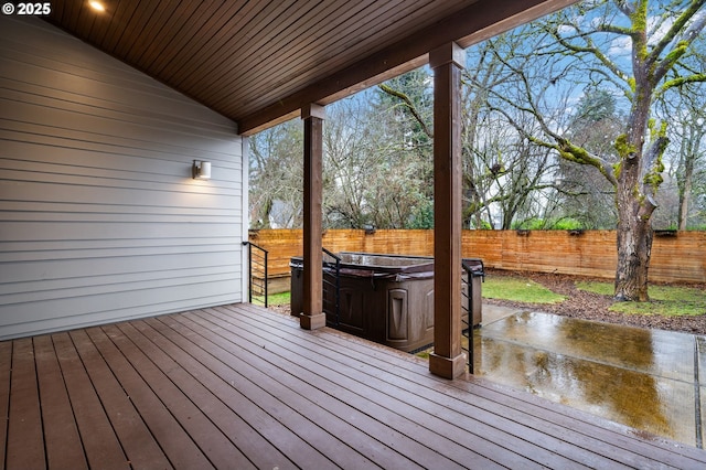 deck with a hot tub