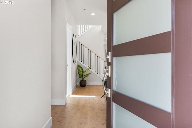 entryway with light hardwood / wood-style flooring