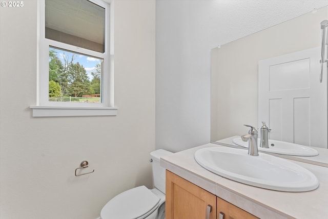 half bath with toilet and vanity