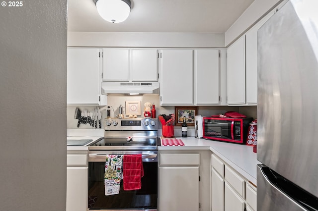 151 Treehill Loop, Eugene, OR 97405 - kitchen with stainless steel appliances, under cabinet range hood, light countertops, and white cabinets