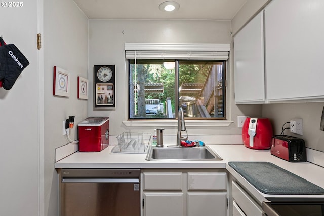 151 Treehill Loop, Eugene, OR 97405 - kitchen featuring dishwasher, a sink, white cabinetry, and light countertops
