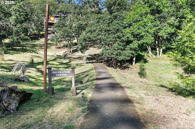 151 Treehill Loop, Eugene, OR 97405 - view of asphalt driveway featuring view of wooded area