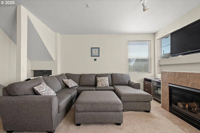10238 NE Snoqualmie St, Hillsboro, OR 97006 - living room with light carpet and a fireplace