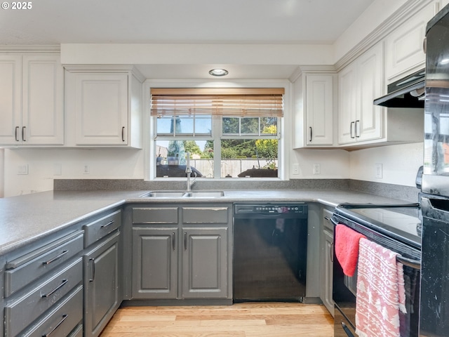 611 NW 4th Pl, Battle Ground, WA 98604 - kitchen featuring dishwasher, gray cabinets, white cabinetry, under cabinet range hood, and light wood finished floors