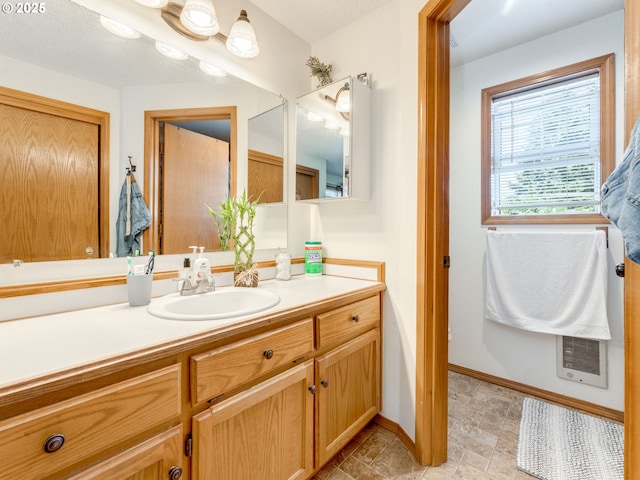 611 NW 4th Pl, Battle Ground, WA 98604 - bathroom with vanity and baseboards