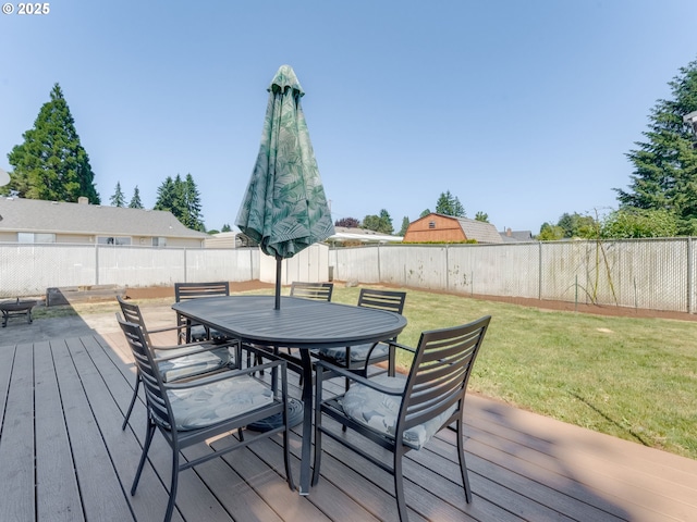 611 NW 4th Pl, Battle Ground, WA 98604 - wooden deck featuring outdoor dining space and a fenced backyard