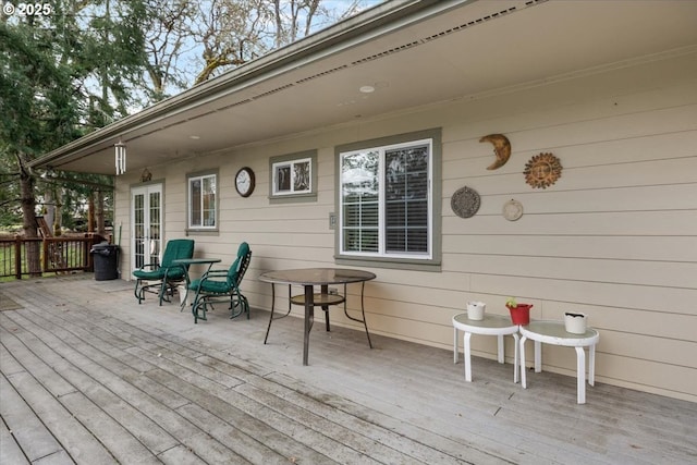 165 Lynn Ct, Winchester, OR 97495 - carpeted bedroom featuring ornamental molding, a ceiling fan, baseboards, and attic access