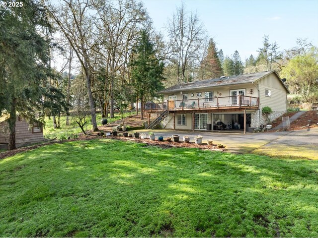 165 Lynn Ct, Winchester, OR 97495 - bathroom with tile walls, a stall shower, a wainscoted wall, vanity, and toilet