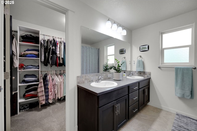 1345 Skyline Park Loop, Eugene, OR 97405 - full bathroom with double vanity and a spacious closet