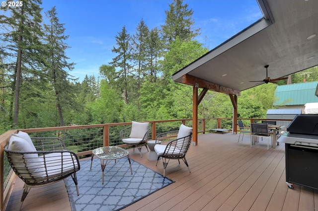 1345 Skyline Park Loop, Eugene, OR 97405 - wooden terrace featuring a ceiling fan, a view of trees, and a grill