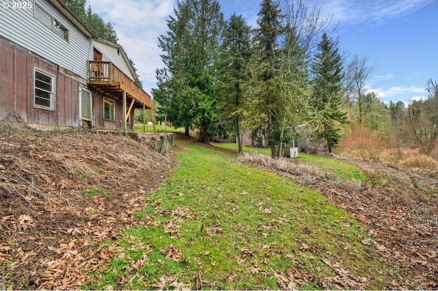 view of yard featuring a deck