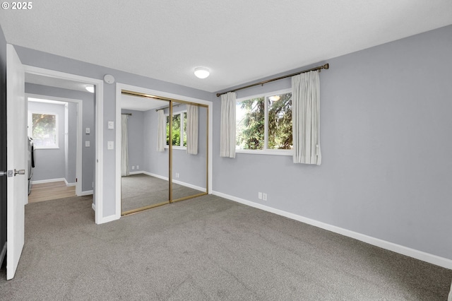 1500 Norkenzie Rd, Eugene, OR 97401 - unfurnished bedroom featuring carpet and a closet