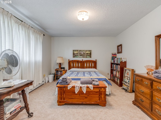 bedroom featuring light carpet, a textured ceiling, and a baseboard radiator
