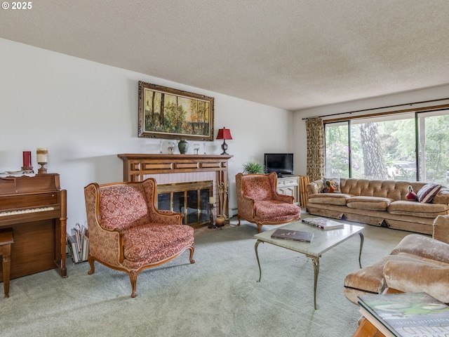 carpeted living area with a textured ceiling, baseboard heating, and a brick fireplace