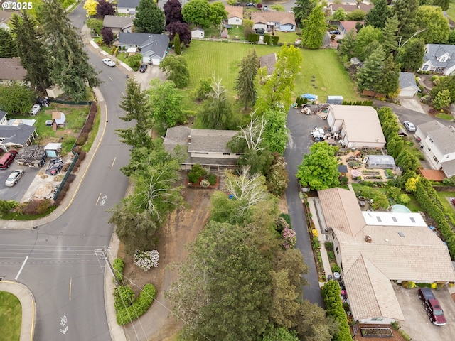 aerial view of property's location with nearby suburban area