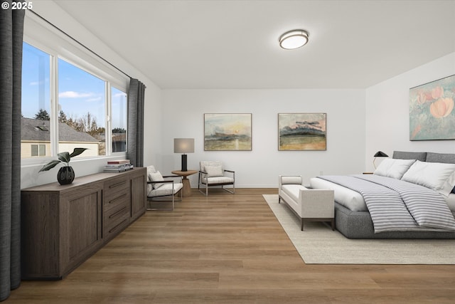 bedroom with light hardwood / wood-style floors