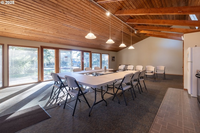 dining area featuring beamed ceiling, wooden ceiling, and high vaulted ceiling