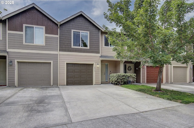 9513 NE 73rd St, Vancouver, WA 98662 - multi unit property with a garage, concrete driveway, and board and batten siding