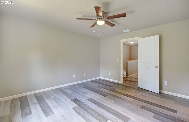 9513 NE 73rd St, Vancouver, WA 98662 - empty room featuring a ceiling fan, light wood-type flooring, and baseboards