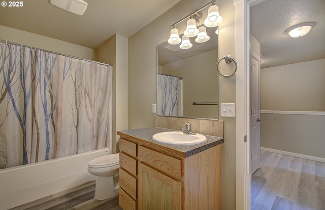 9513 NE 73rd St, Vancouver, WA 98662 - bathroom featuring wood finished floors, vanity, toilet, and shower / tub combo with curtain