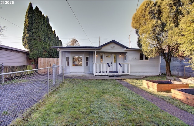 view of front facade with a porch and a front yard