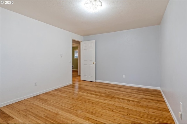 empty room featuring light hardwood / wood-style floors