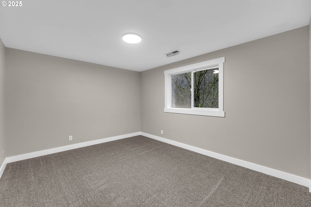 spare room with carpet floors