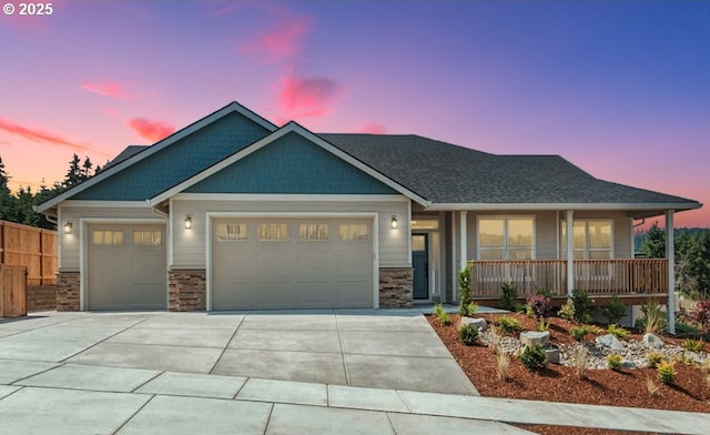 774 Riley Dr, Silverton, OR 97381 - craftsman inspired home featuring a garage, covered porch, driveway, and stone siding