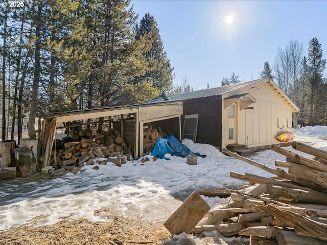 view of snow covered garage