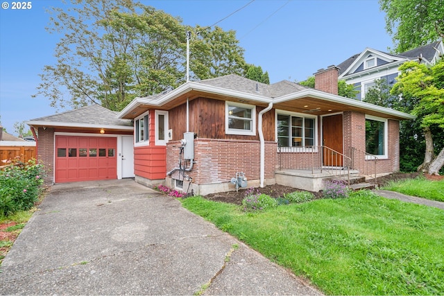 view of front of house featuring a chimney, brick siding, a detached garage, and a shingled roof