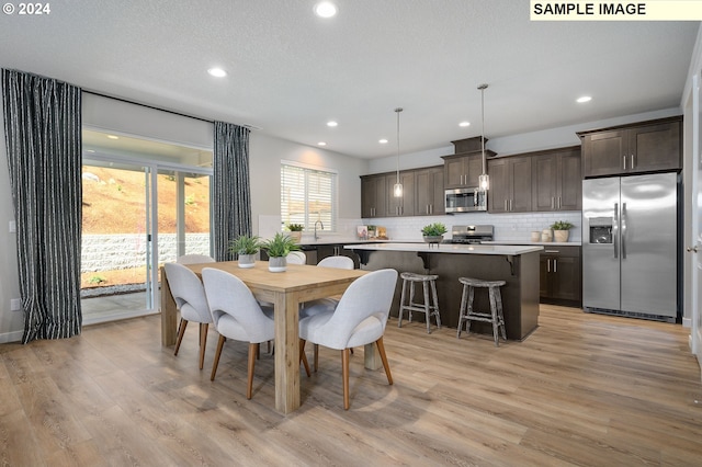 9203 S 3rd St Unit 113, Ridgefield, WA 98642 - dining room with light wood finished floors and recessed lighting