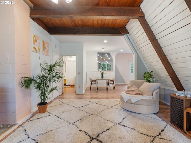 1171 Mabee Mines Rd, Washougal, WA 98671 - living area with wood finished floors, a wood ceiling with exposed beams, and a chandelier