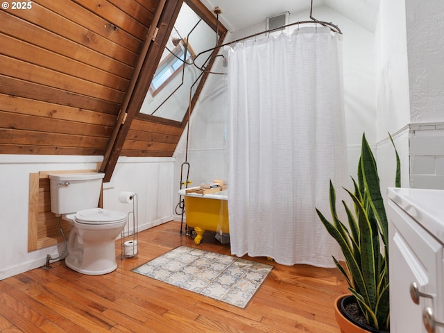 1171 Mabee Mines Rd, Washougal, WA 98671 - bathroom with vaulted ceiling, wood-type flooring, curtained shower, and vanity