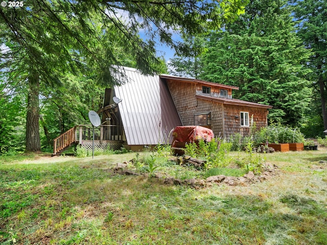 1171 Mabee Mines Rd, Washougal, WA 98671 - view of home's exterior with a metal roof and a wooden deck