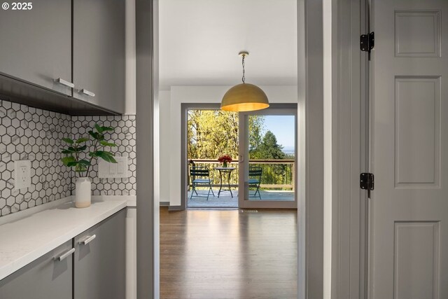 doorway to outside featuring wood finished floors